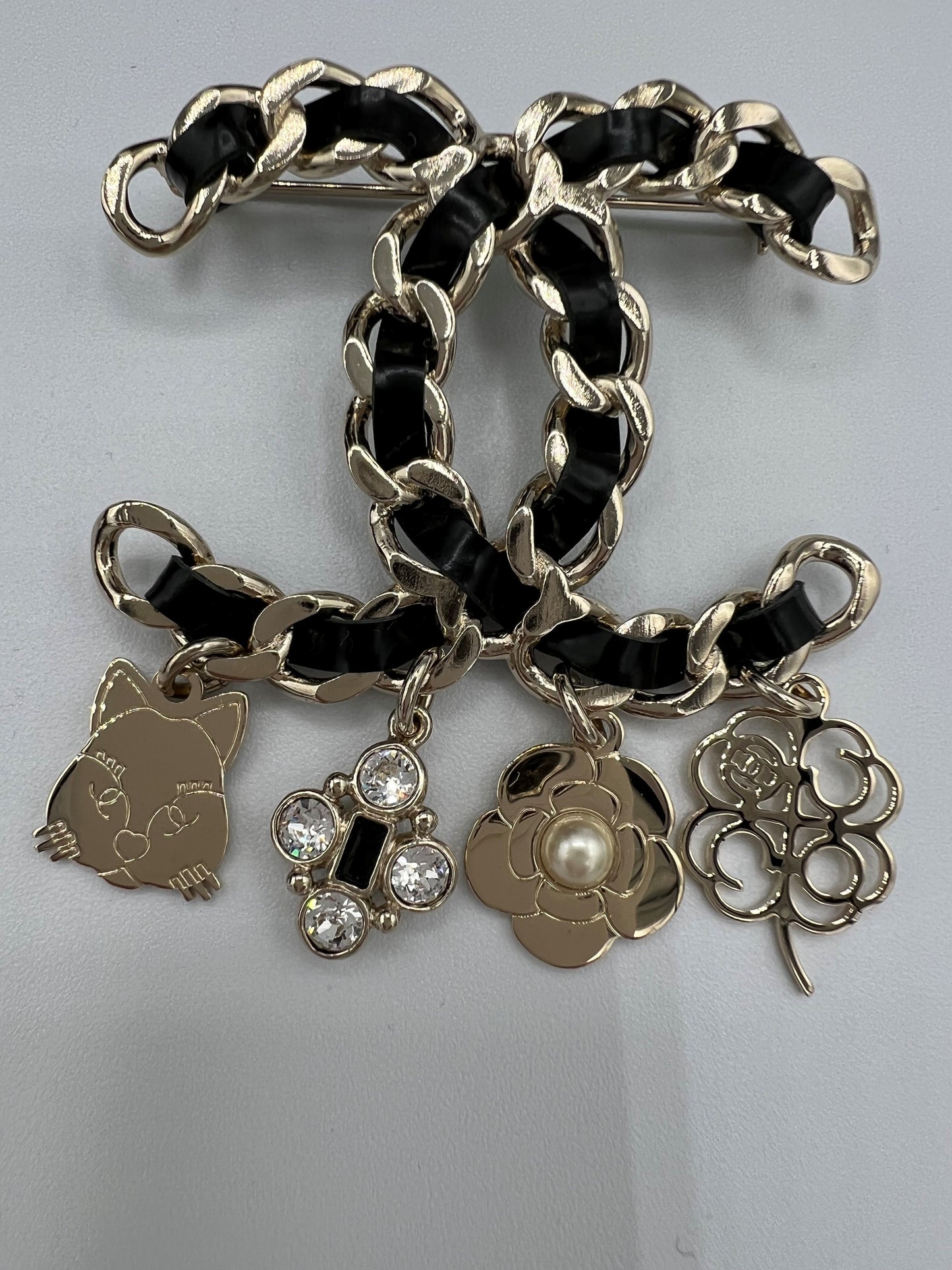 Chanel Leather Woven Brooch with Charms