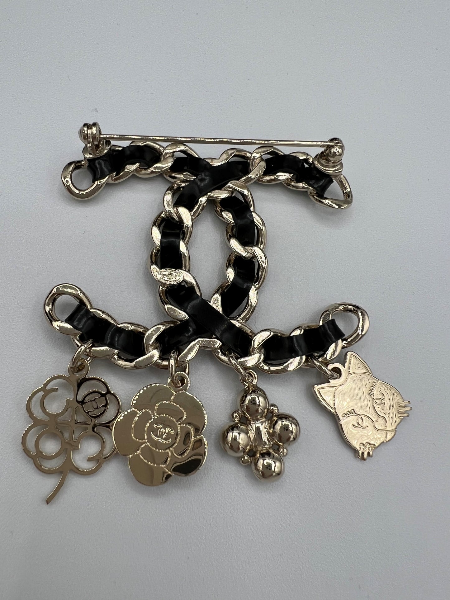 Chanel Leather Woven Brooch with Charms