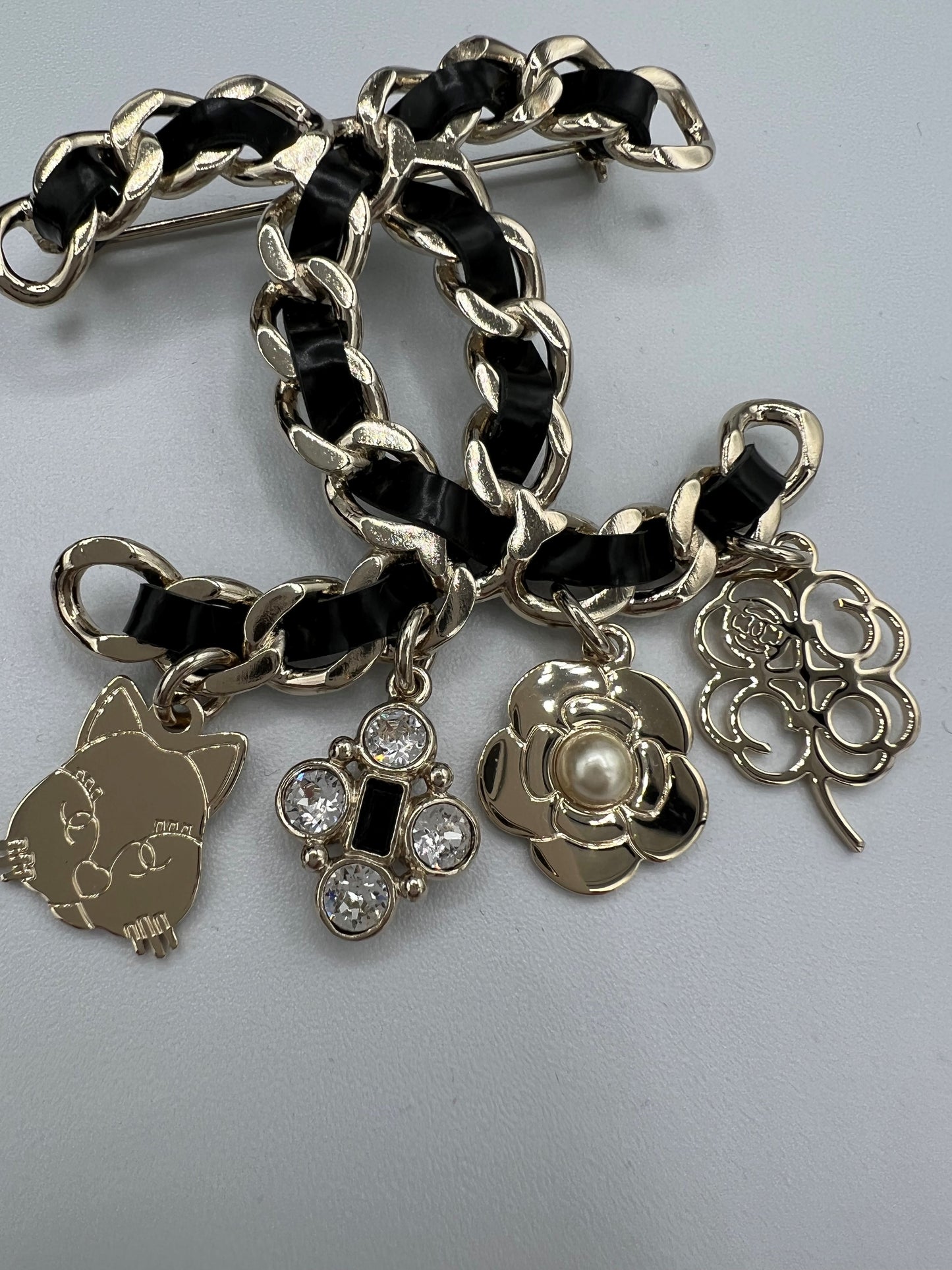 Chanel Leather Woven Brooch with Charms