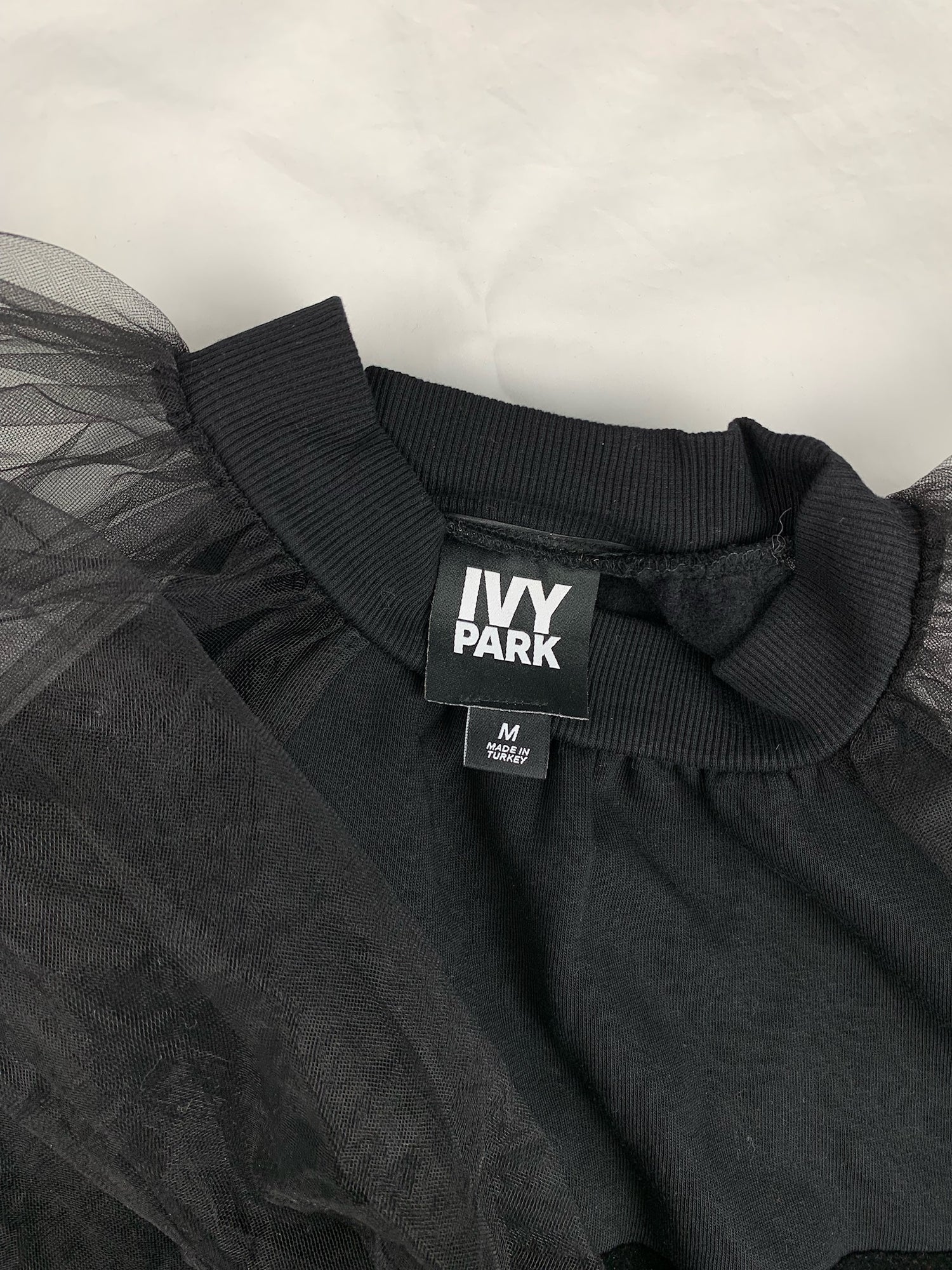 Ivy Park fleece lined and mesh sleeved sweater
