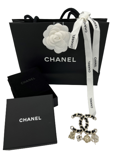 Pre owned Chanel Leather Woven Brooch with Charms